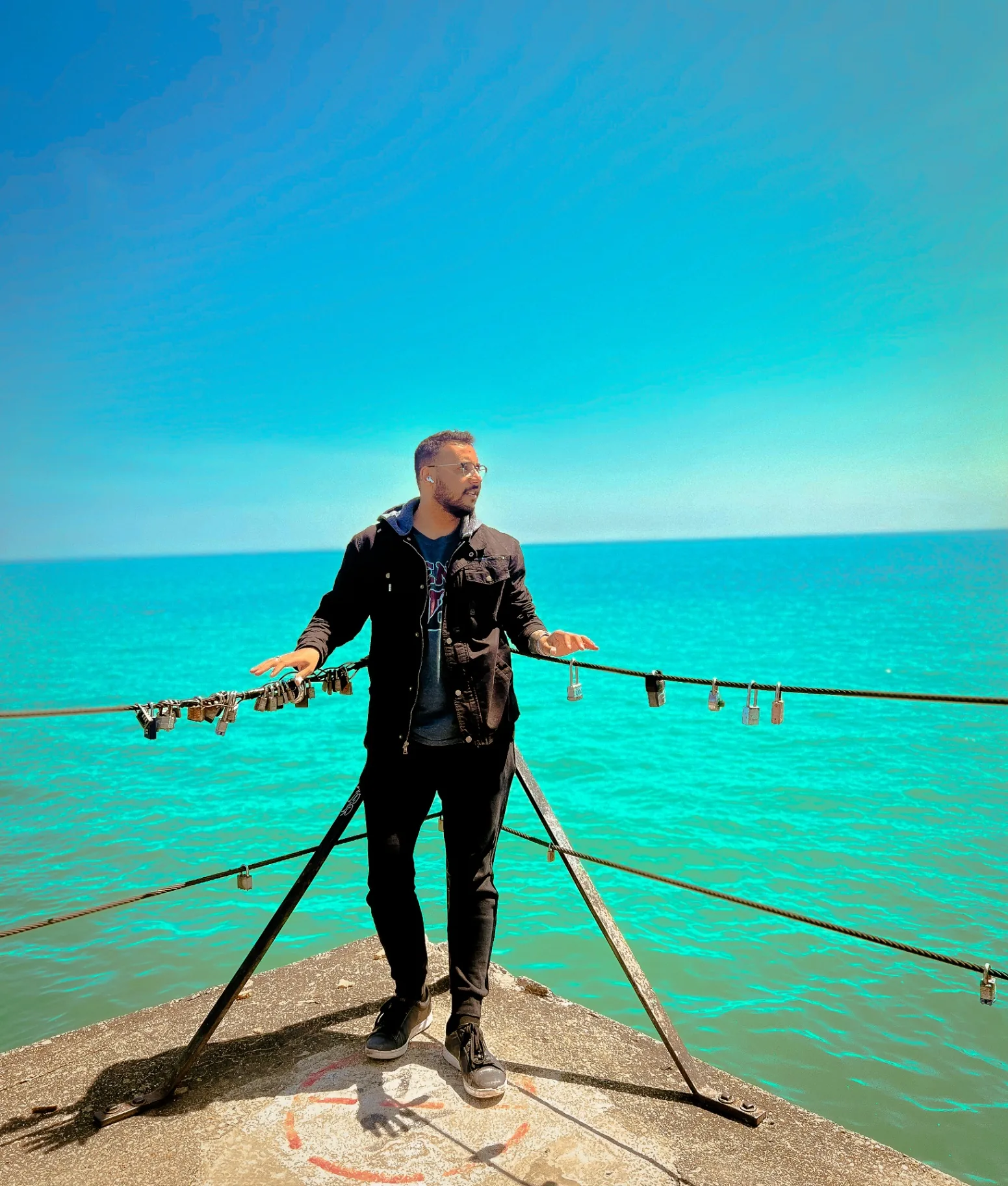 On the pier over turquoise Lake Michigan